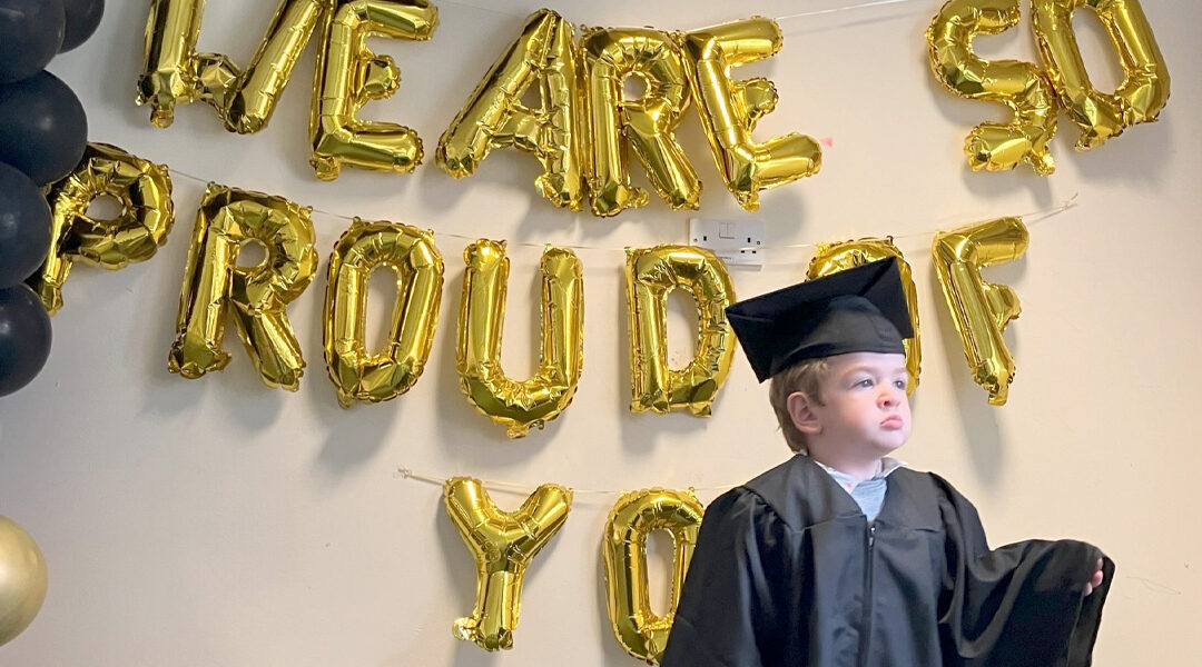 child at peter pan graduation ceremony